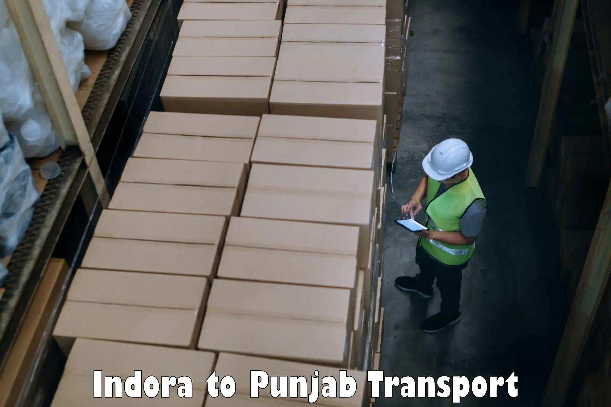 Two wheeler parcel service Indora to Punjab